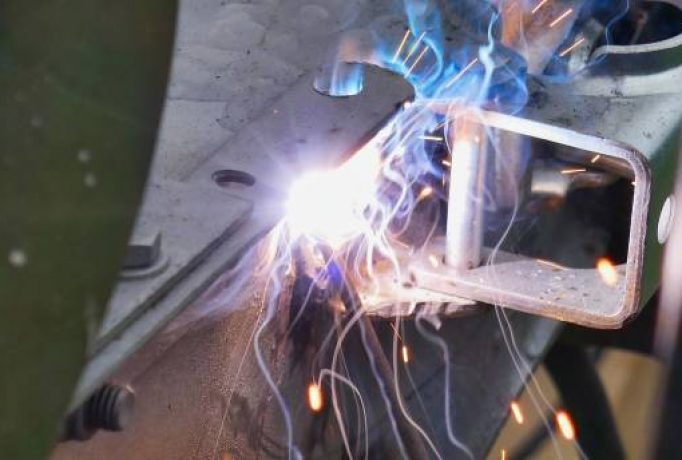 welder at work, photo as a background, digital image